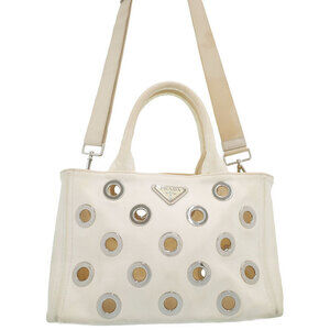 Prada Canapa grommet embellished canvas bag white